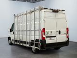 a white van that is parked inside of a building