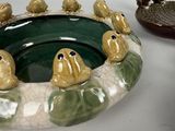 a lot of birds that are sitting in a bowl