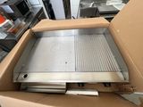 a box that has a grill inside of it
