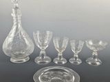 a lot of glass items that are on a table