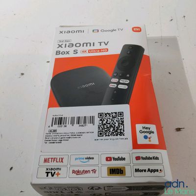 packaging of a box with a remote and a barcode on it