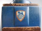 a close up of a blue vase with a lion on it