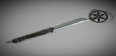 a knife that is laying on a table