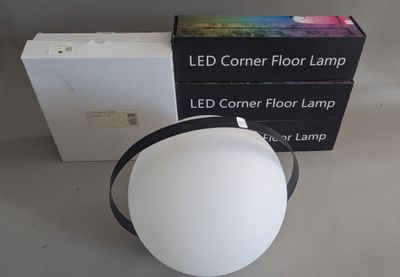 a light that is sitting on a table next to a box