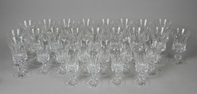 a lot of wine glasses that are sitting on a table