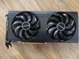a close up of a video card with two fans on top of it
