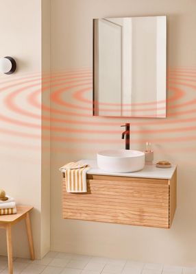 a bathroom with a sink and a mirror on the wall