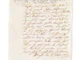 une lettre écrite à l'encre noire sur une feuille de papier