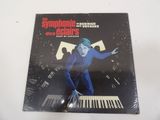 a close up of a cd cover with a person on a piano