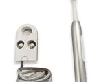 an image of a toothbrush with a cord attached to it