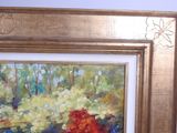 a picture of a painting of flowers in a gold frame