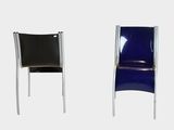 two black and blue chairs sitting next to each other on a white surface