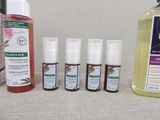 several different types of skin care products sitting on a table