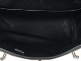 the inside of a black leather purse with a metal handle