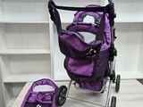 a purple stroller and a purple bag on a table