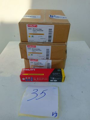 several boxes and a piece of paper sitting on top of a table