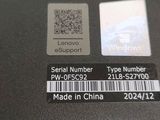 a close up of a laptop with a qr code on it
