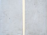 two pieces of white cement on a white surface