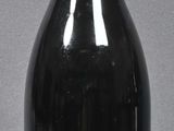 a bottle of wine that is sitting on a table