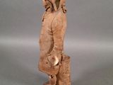 statue of a man with a dog on his back