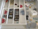 a drawer full of medicine and other medical supplies