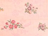 a pink floral wallpaper with pink flowers on it