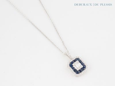 the necklace is made of silver and blue sapphire stones