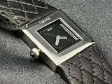 an image of a wrist watch with a black dial