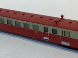 a toy train that is sitting on a white surface