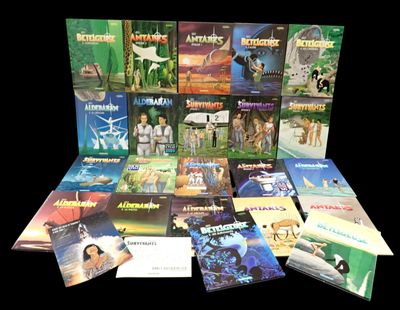 un grand nombre de livres posés sur une table
