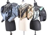 three mannequins with different types of clothing on them