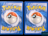 two pokemon cards with a red and white poke - ball on them