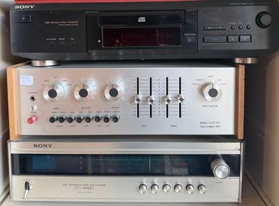 many different types of audio equipment stacked on top of each other