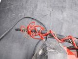 a red wire that is connected to a black box