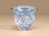 a clear glass vase with a design on it