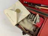 an open suitcase with a bunch of items inside of it