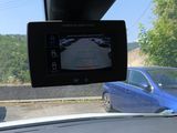 a view of a car from the inside of a vehicle