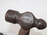 a close up of a hammer on a table