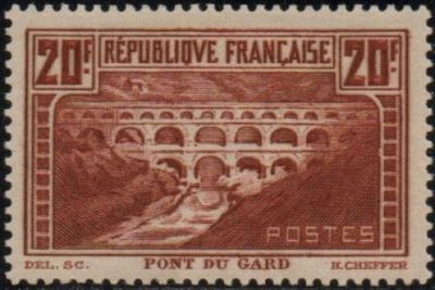 a stamp with a picture of a bridge on it