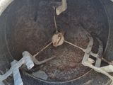 a close up of a cement pipe with a broken handle