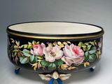 an image of a bowl with flowers painted on it
