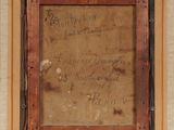an old picture of a picture with writing on it in a wooden frame