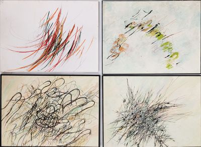 four different colored drawings of different shapes and sizes on a white surface