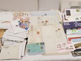 a table with many different types of mail on it