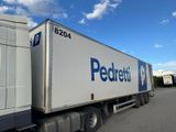 a semi truck that is parked in a parking lot
