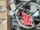 a box full of assorted items sitting on the floor