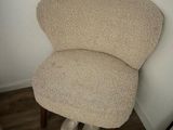 a chair that is sitting in the corner of a room