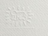 a close up of a piece of white paper with a sun drawn on it