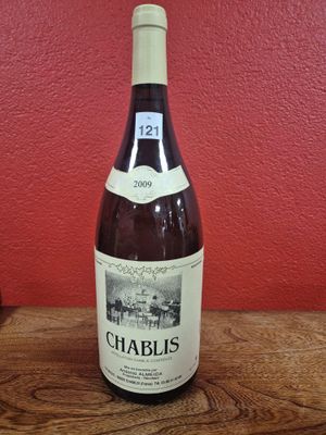 a bottle of wine that is sitting on a table