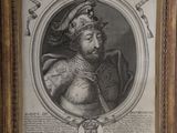 a framed picture of a man wearing a crown and holding a sword